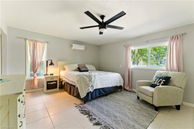 Nestled in an up-and-coming neighborhood backing up to a on Golden Gate Country Club in Florida - for sale on GolfHomes.com, golf home, golf lot