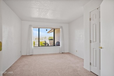 This spacious Southwest-style custom pool home is perfect for on Cerbat Cliffs Golf Course in Arizona - for sale on GolfHomes.com, golf home, golf lot