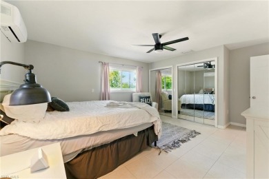 Nestled in an up-and-coming neighborhood backing up to a on Golden Gate Country Club in Florida - for sale on GolfHomes.com, golf home, golf lot