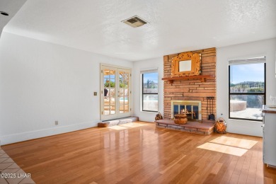 This spacious Southwest-style custom pool home is perfect for on Cerbat Cliffs Golf Course in Arizona - for sale on GolfHomes.com, golf home, golf lot