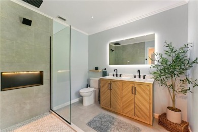 Nestled in an up-and-coming neighborhood backing up to a on Golden Gate Country Club in Florida - for sale on GolfHomes.com, golf home, golf lot