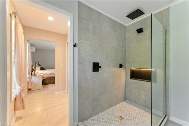Nestled in an up-and-coming neighborhood backing up to a on Golden Gate Country Club in Florida - for sale on GolfHomes.com, golf home, golf lot