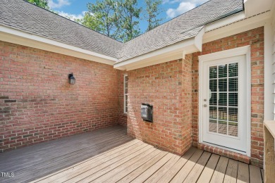 EXQUISITE 3 bed, 2.5 bath brick ranch style home settled on a on Gates Four Golf and Country Club in North Carolina - for sale on GolfHomes.com, golf home, golf lot