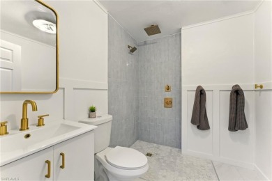 Nestled in an up-and-coming neighborhood backing up to a on Golden Gate Country Club in Florida - for sale on GolfHomes.com, golf home, golf lot
