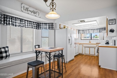 This spacious Southwest-style custom pool home is perfect for on Cerbat Cliffs Golf Course in Arizona - for sale on GolfHomes.com, golf home, golf lot