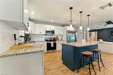 Nestled in an up-and-coming neighborhood backing up to a on Golden Gate Country Club in Florida - for sale on GolfHomes.com, golf home, golf lot