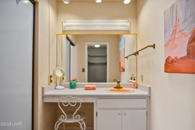 This spacious Southwest-style custom pool home is perfect for on Cerbat Cliffs Golf Course in Arizona - for sale on GolfHomes.com, golf home, golf lot
