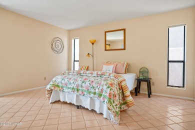 This spacious Southwest-style custom pool home is perfect for on Cerbat Cliffs Golf Course in Arizona - for sale on GolfHomes.com, golf home, golf lot