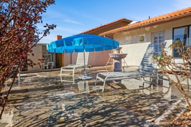 This spacious Southwest-style custom pool home is perfect for on Cerbat Cliffs Golf Course in Arizona - for sale on GolfHomes.com, golf home, golf lot