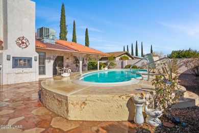 This spacious Southwest-style custom pool home is perfect for on Cerbat Cliffs Golf Course in Arizona - for sale on GolfHomes.com, golf home, golf lot