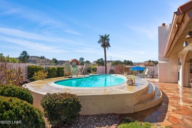 This spacious Southwest-style custom pool home is perfect for on Cerbat Cliffs Golf Course in Arizona - for sale on GolfHomes.com, golf home, golf lot