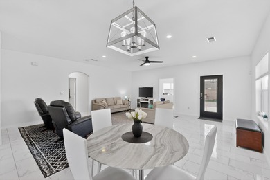 Enjoy the golf course community in this almost new home modern on Tierra Del Sol Golf Course in New Mexico - for sale on GolfHomes.com, golf home, golf lot