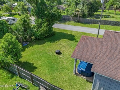 Well-maintained 3-bedroom, 2-bath home located in central Lynn on Panama Country Club in Florida - for sale on GolfHomes.com, golf home, golf lot