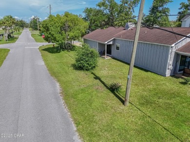 Well-maintained 3-bedroom, 2-bath home located in central Lynn on Panama Country Club in Florida - for sale on GolfHomes.com, golf home, golf lot