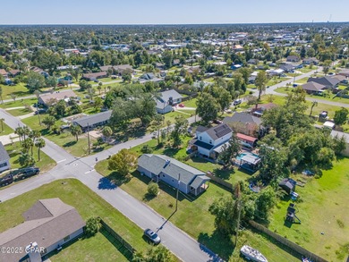Well-maintained 3-bedroom, 2-bath home with a brand new roof is on Panama Country Club in Florida - for sale on GolfHomes.com, golf home, golf lot