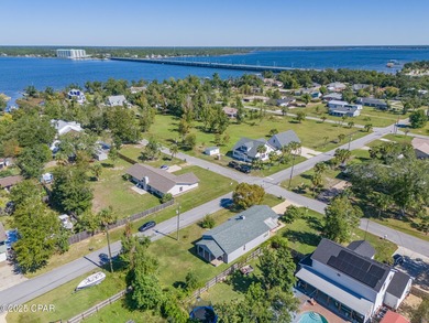 Well-maintained 3-bedroom, 2-bath home with a brand new roof is on Panama Country Club in Florida - for sale on GolfHomes.com, golf home, golf lot