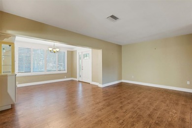 The ENCLOSED FLORIDA ROOM Under Heat and Air adds almost 450 sq on Highland Lakes Executive Golf Course in Florida - for sale on GolfHomes.com, golf home, golf lot