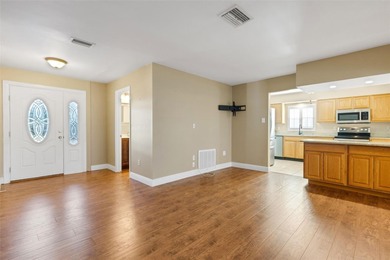 The ENCLOSED FLORIDA ROOM Under Heat and Air adds almost 450 sq on Highland Lakes Executive Golf Course in Florida - for sale on GolfHomes.com, golf home, golf lot