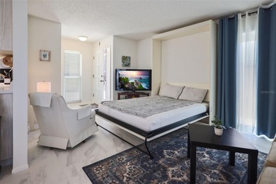 Under contract-accepting backup offers. Sunlight pours into this on Highland Lakes Executive Golf Course in Florida - for sale on GolfHomes.com, golf home, golf lot