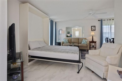 Under contract-accepting backup offers. Sunlight pours into this on Highland Lakes Executive Golf Course in Florida - for sale on GolfHomes.com, golf home, golf lot