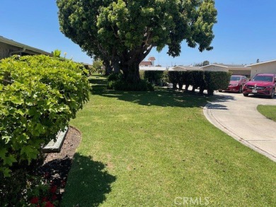 (Mutual 14-2-L)... Steps to GOLF COURSE with a glimpse of the on Leisure World Seal Beach Golf Course in California - for sale on GolfHomes.com, golf home, golf lot