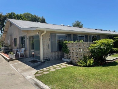 (Mutual 14-2-L)... Steps to GOLF COURSE with a glimpse of the on Leisure World Seal Beach Golf Course in California - for sale on GolfHomes.com, golf home, golf lot