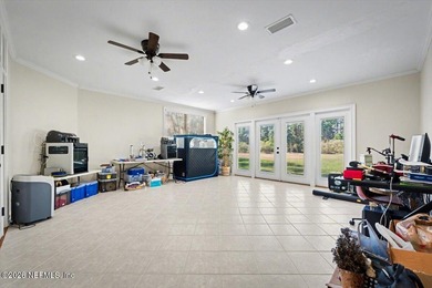 This delightful 5-bedroom, 3-bathroom custom brick home is a on Country Club of Orange Park in Florida - for sale on GolfHomes.com, golf home, golf lot