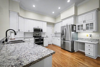 This delightful 5-bedroom, 3-bathroom custom brick home is a on Country Club of Orange Park in Florida - for sale on GolfHomes.com, golf home, golf lot