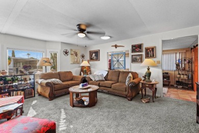 Lovely 2 bed, 2 bath home with an enclosed AZ room adding 250 sq on Apache Creek Golf Club in Arizona - for sale on GolfHomes.com, golf home, golf lot