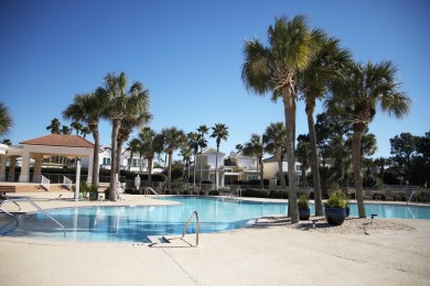 Gated community, nested on the 7th fairway of the Marsh golf on Bluewater Bay Resort in Florida - for sale on GolfHomes.com, golf home, golf lot