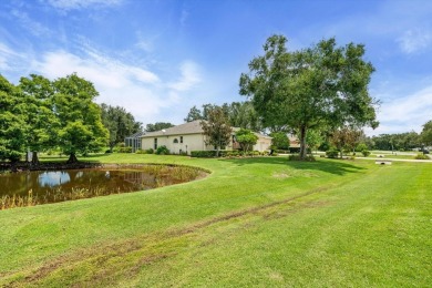 Nestled on over an acre of beautifully manicured and mature on Oak Ford Golf Club in Florida - for sale on GolfHomes.com, golf home, golf lot