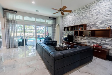 Impressive 3BR/3.5BA/2CG golf-front pool home in PGA Verano 4th on PGA Golf Club in PGA Village in Florida - for sale on GolfHomes.com, golf home, golf lot