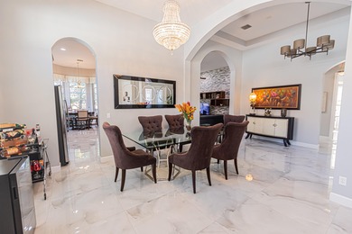 Impressive 3BR/3.5BA/2CG golf-front pool home in PGA Verano 4th on PGA Golf Club in PGA Village in Florida - for sale on GolfHomes.com, golf home, golf lot