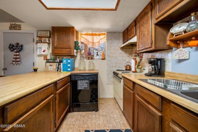 Escape to the tranquility of the countryside with this beautiful on Silver Creek Golf Club in Arizona - for sale on GolfHomes.com, golf home, golf lot