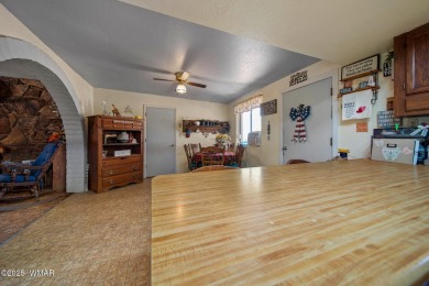 Escape to the tranquility of the countryside with this beautiful on Silver Creek Golf Club in Arizona - for sale on GolfHomes.com, golf home, golf lot