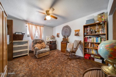 Escape to the tranquility of the countryside with this beautiful on Silver Creek Golf Club in Arizona - for sale on GolfHomes.com, golf home, golf lot