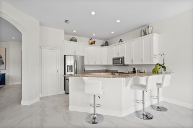 Beautifully renovated 3-bedroom, 2-bath home with an oversized on Monarch Country Club in Florida - for sale on GolfHomes.com, golf home, golf lot