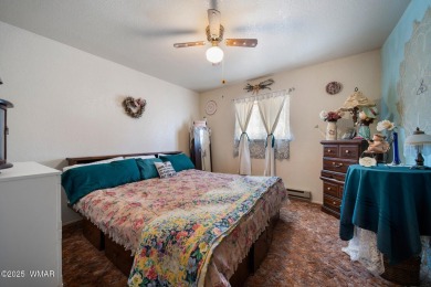Escape to the tranquility of the countryside with this beautiful on Silver Creek Golf Club in Arizona - for sale on GolfHomes.com, golf home, golf lot