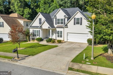 Welcome to this beautifully updated home nestled in the highly on Summergrove Golf Club in Georgia - for sale on GolfHomes.com, golf home, golf lot