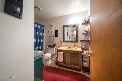 Escape to the tranquility of the countryside with this beautiful on Silver Creek Golf Club in Arizona - for sale on GolfHomes.com, golf home, golf lot