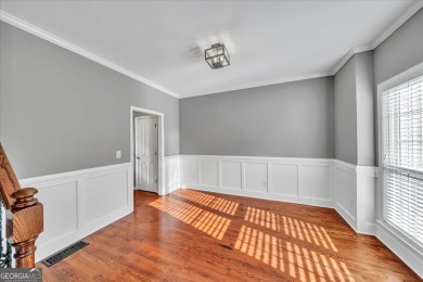 Welcome to this beautifully updated home nestled in the highly on Summergrove Golf Club in Georgia - for sale on GolfHomes.com, golf home, golf lot