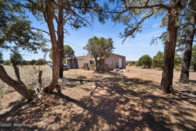 Escape to the tranquility of the countryside with this beautiful on Silver Creek Golf Club in Arizona - for sale on GolfHomes.com, golf home, golf lot