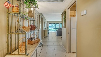 Highly sought after 2 Bedroom and 2 Bath Condo with fabulous on Palm Aire Country Club of Sarasota in Florida - for sale on GolfHomes.com, golf home, golf lot