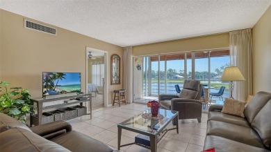 Highly sought after 2 Bedroom and 2 Bath Condo with fabulous on Palm Aire Country Club of Sarasota in Florida - for sale on GolfHomes.com, golf home, golf lot