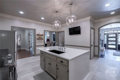 Welcome to 1291 Millstone Run, a stunning four bedroom, four on Jennings Mill Country Club in Georgia - for sale on GolfHomes.com, golf home, golf lot