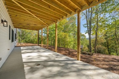 Discover luxury mountain living in this new construction on Trillium Links in North Carolina - for sale on GolfHomes.com, golf home, golf lot