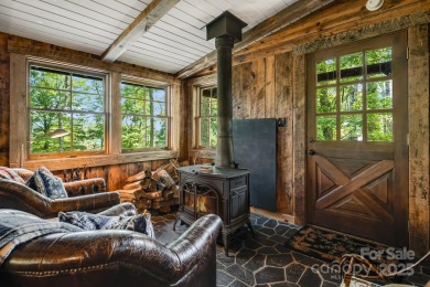 Perched at the pinnacle of the 5,300-acre gated Wolf Laurel on Wolf Laurel Country Club in North Carolina - for sale on GolfHomes.com, golf home, golf lot
