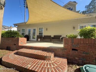 Welcome to this charming 3-bedroom, 2.5-bath home located in the on Bluff Golf Links in North Carolina - for sale on GolfHomes.com, golf home, golf lot