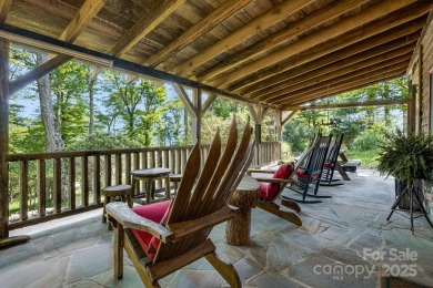 Perched at the pinnacle of the 5,300-acre gated Wolf Laurel on Wolf Laurel Country Club in North Carolina - for sale on GolfHomes.com, golf home, golf lot