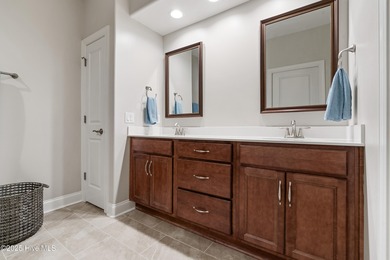 Discover the ultimate opportunity for low-maintenance living in on Compass Pointe Golf Course in North Carolina - for sale on GolfHomes.com, golf home, golf lot